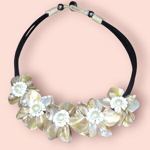 Mother of pearl shell floral statement necklace leather cord button close